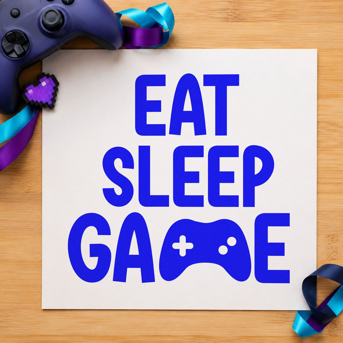 Eat Sleep Game Controller craft stamp in blue ink on cardstock, an easy option for chair cover printing.