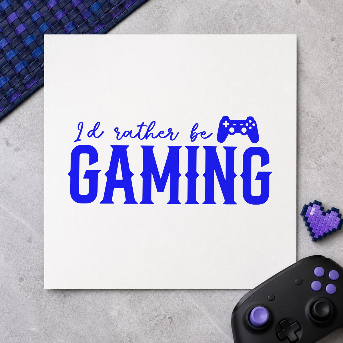 Rather Be Gaming Controller craft stamp imprinted in blue ink on paper, a design suited to framed office shelf.