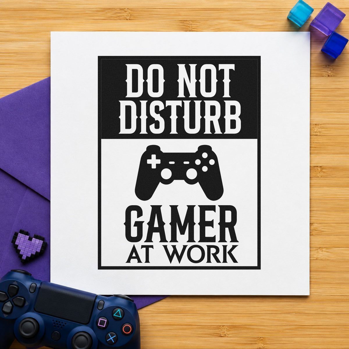 Do Not Disturb Gamer craft stamp imprint in black ink on a handmade project, one idea being merch drop gift tags.