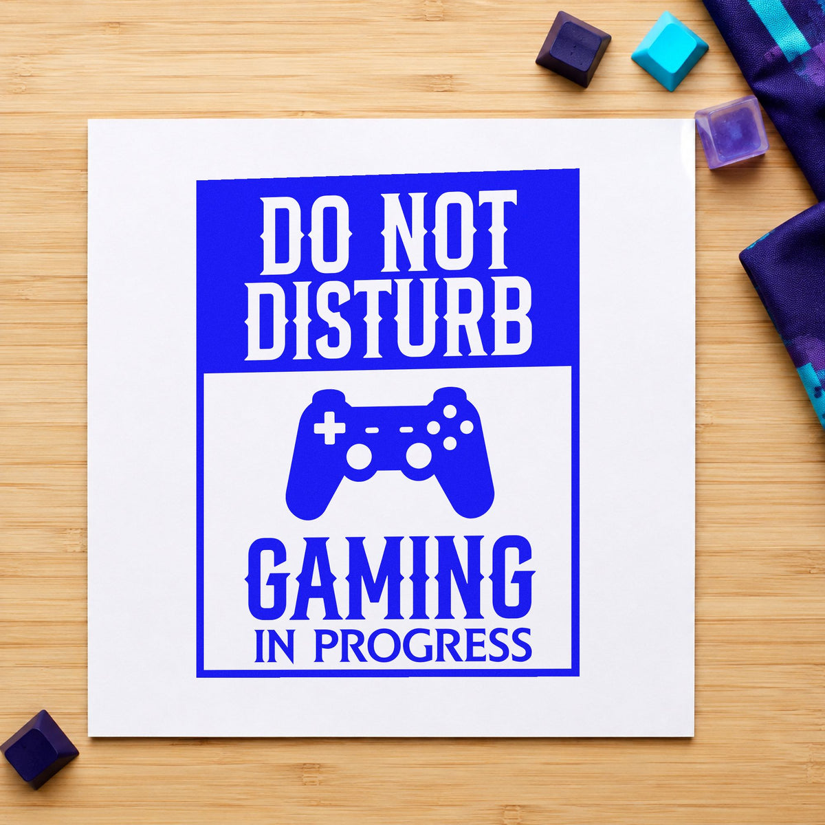 Do Not Disturb Gaming craft stamp imprinted in blue ink on paper, a design suited to framed hall wall.