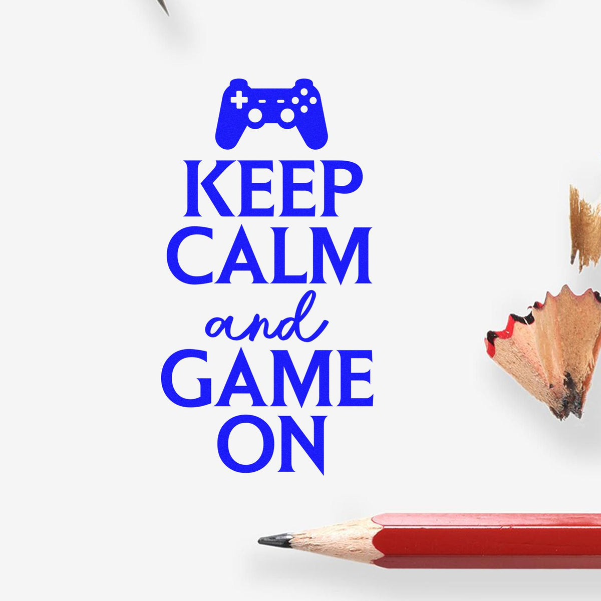 Blue Keep Calm and Game On stamp design with game controller icon, red pencil, and wood shavings on white background.