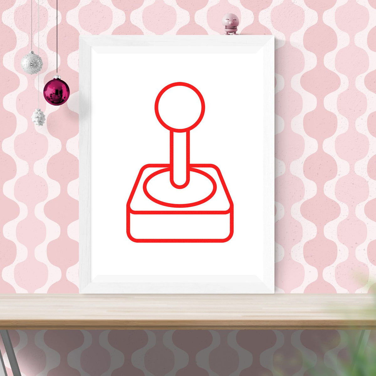 Red rubber stamp seal icon on white frame against pink patterned wall with hanging ornaments.