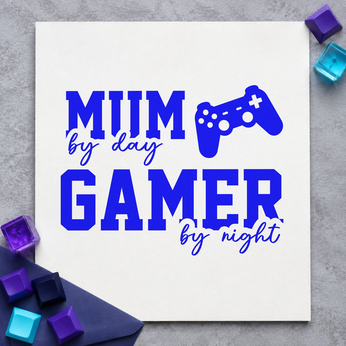 mom Day Gamer Night craft stamp imprinted in blue ink on paper, a design suited to framed landing nook.