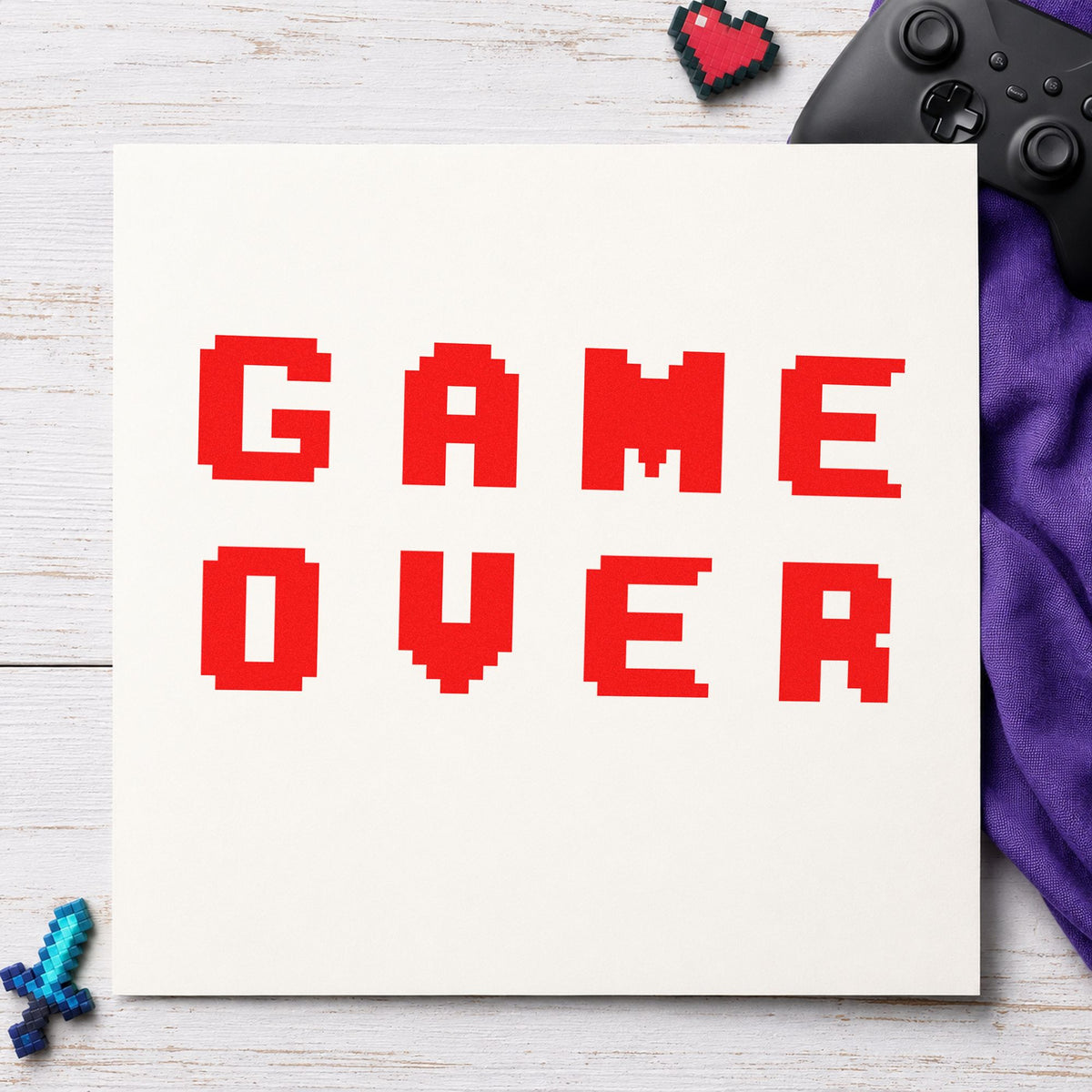Game Over Pixel Lettering rubber stamp shown in red ink, stamped for projects such as bin station labels.
