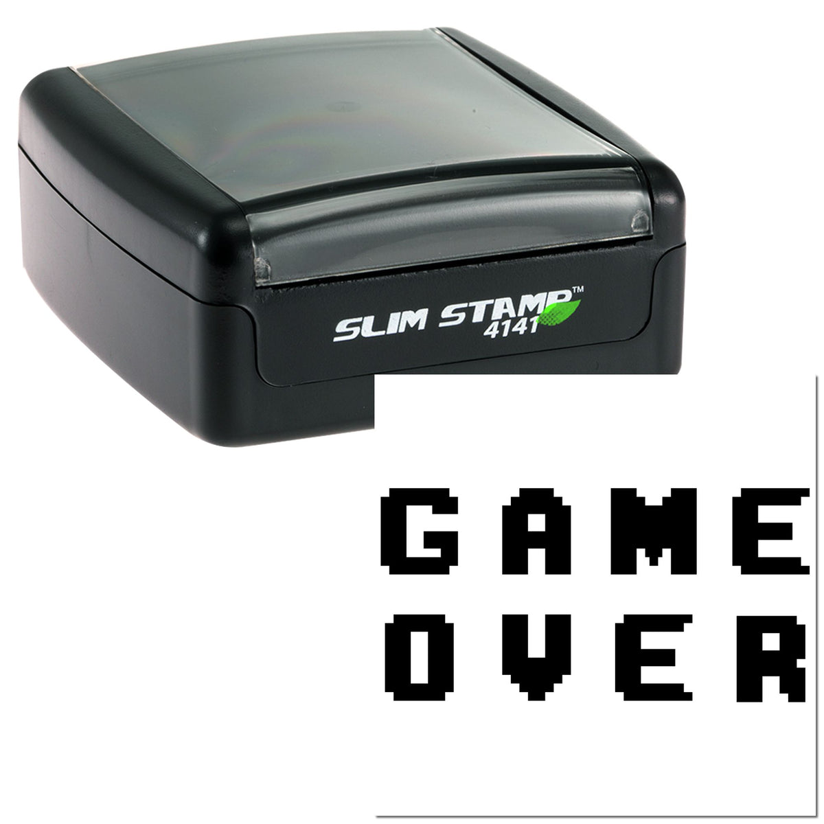 Black slim self-inking stamp and seal with clear cap, printing bold pixel-style GAME OVER on white paper.