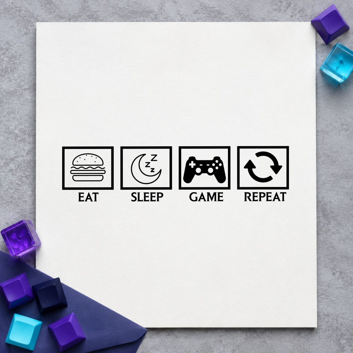 Eat Sleep Game Repeat rubber stamp printed in black ink, ready for week balance sheet and similar paper crafts.