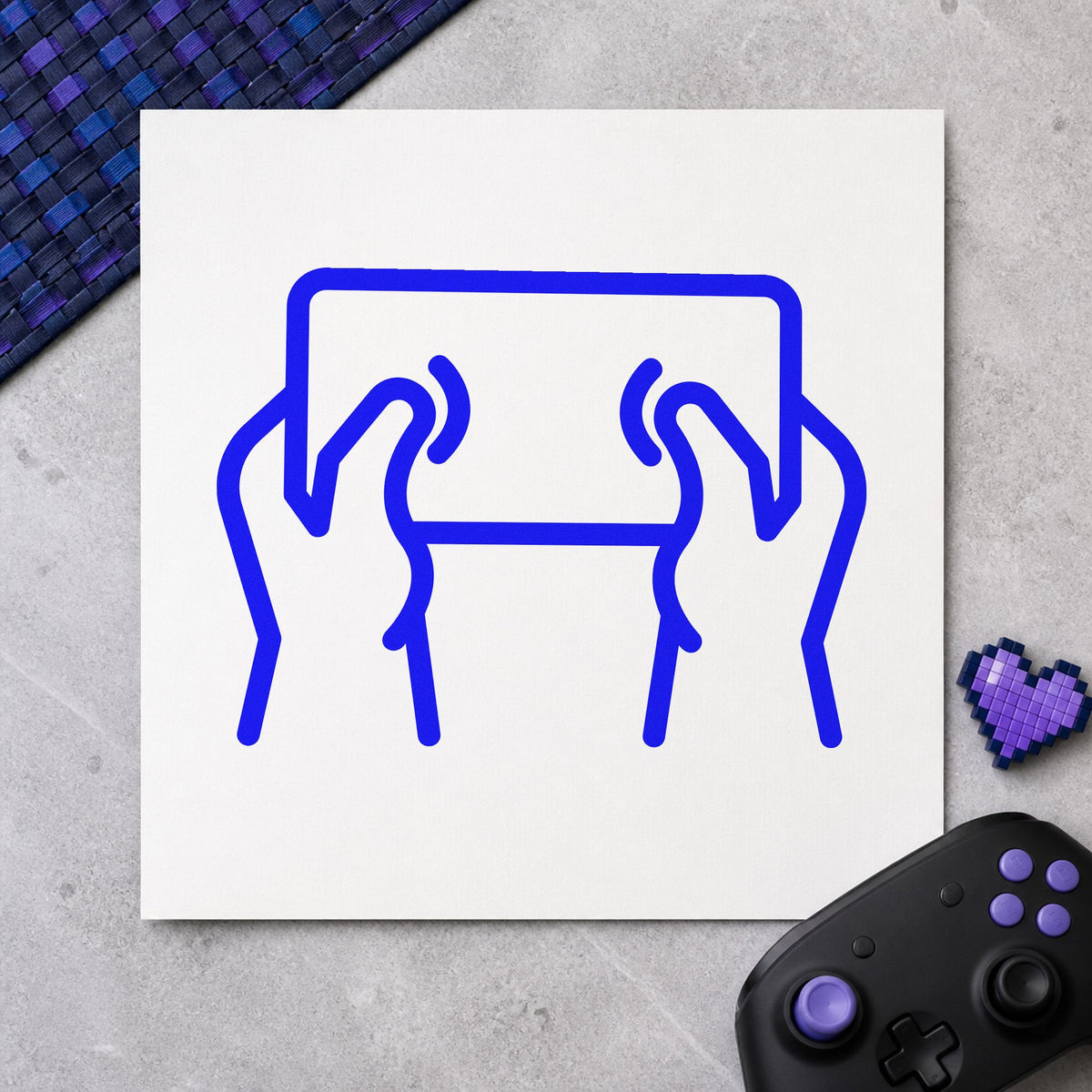 Hands Holding Outlined Tablet craft stamp in blue ink on cardstock, an easy option for tablet sleeve printing.