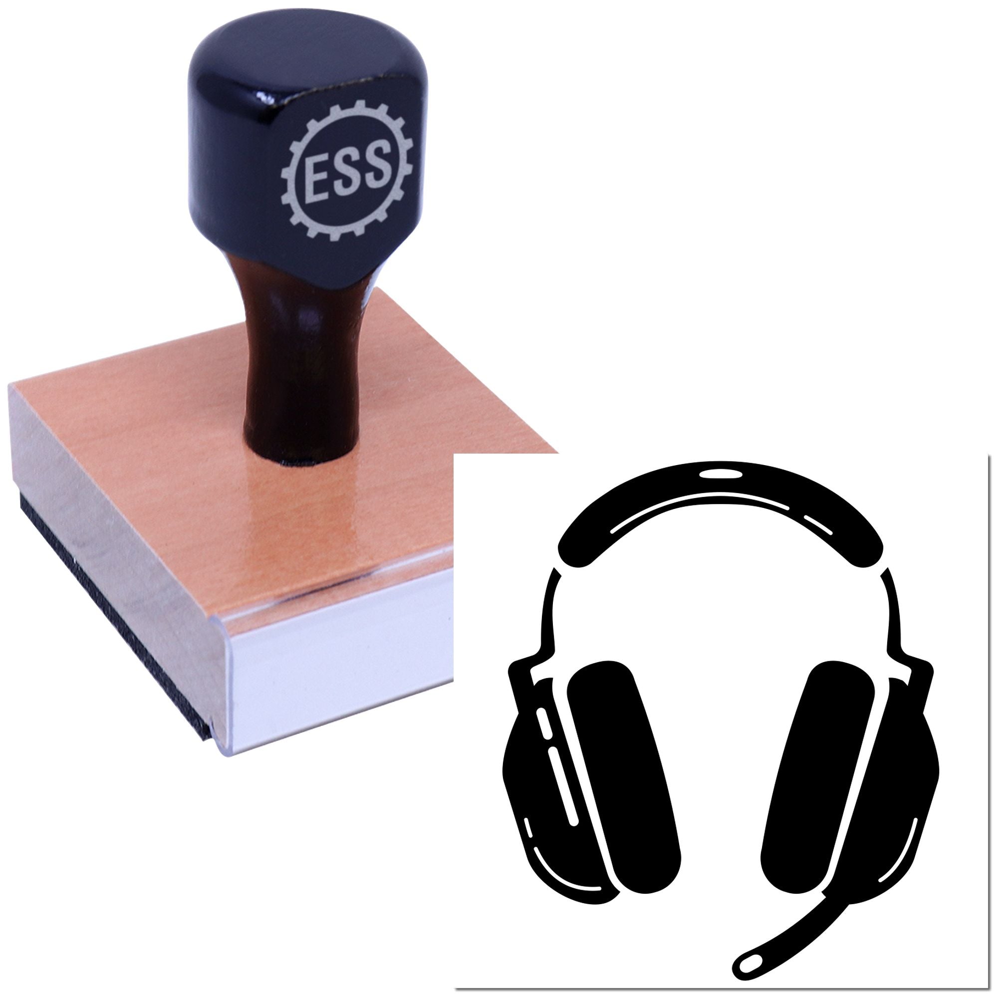 Black ESS stamp on a wooden block with a white-and-black headset seal icon.
