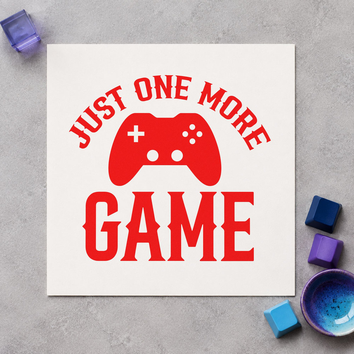 Just One More Game rubber stamp shown in red ink, stamped for projects such as bin pad labels.