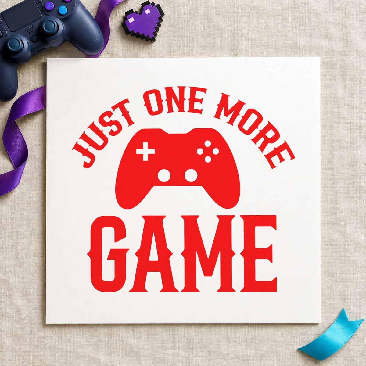 Just One More Game craft stamp imprint in red ink on a handmade project, one idea being score log cards.