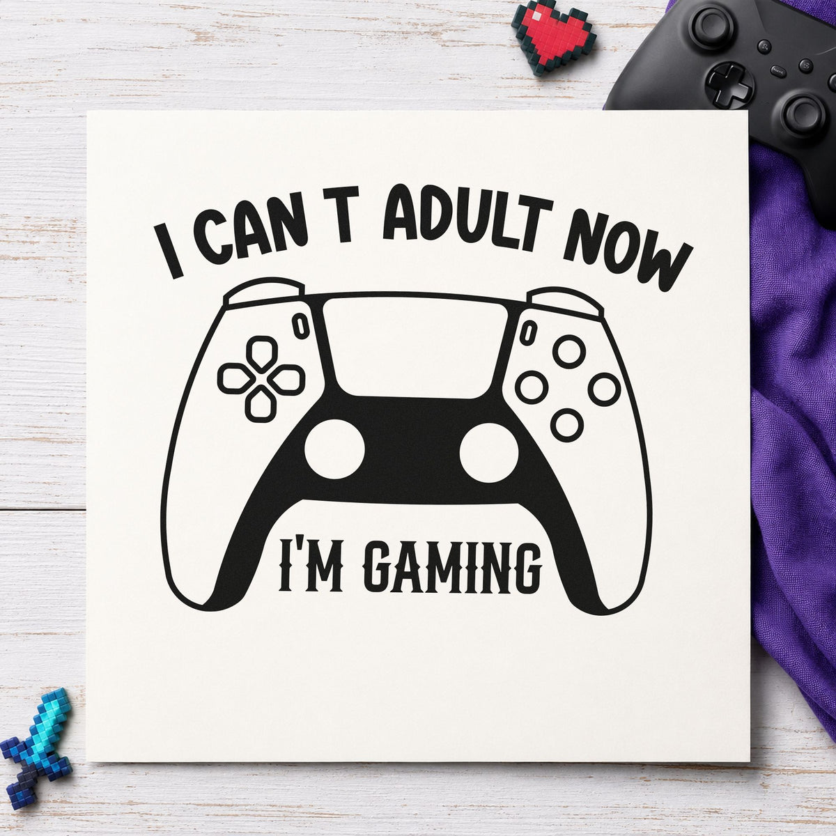 Cannot Adult Now Gaming craft stamp imprint in black ink on a handmade project, one idea being housewarming tags.