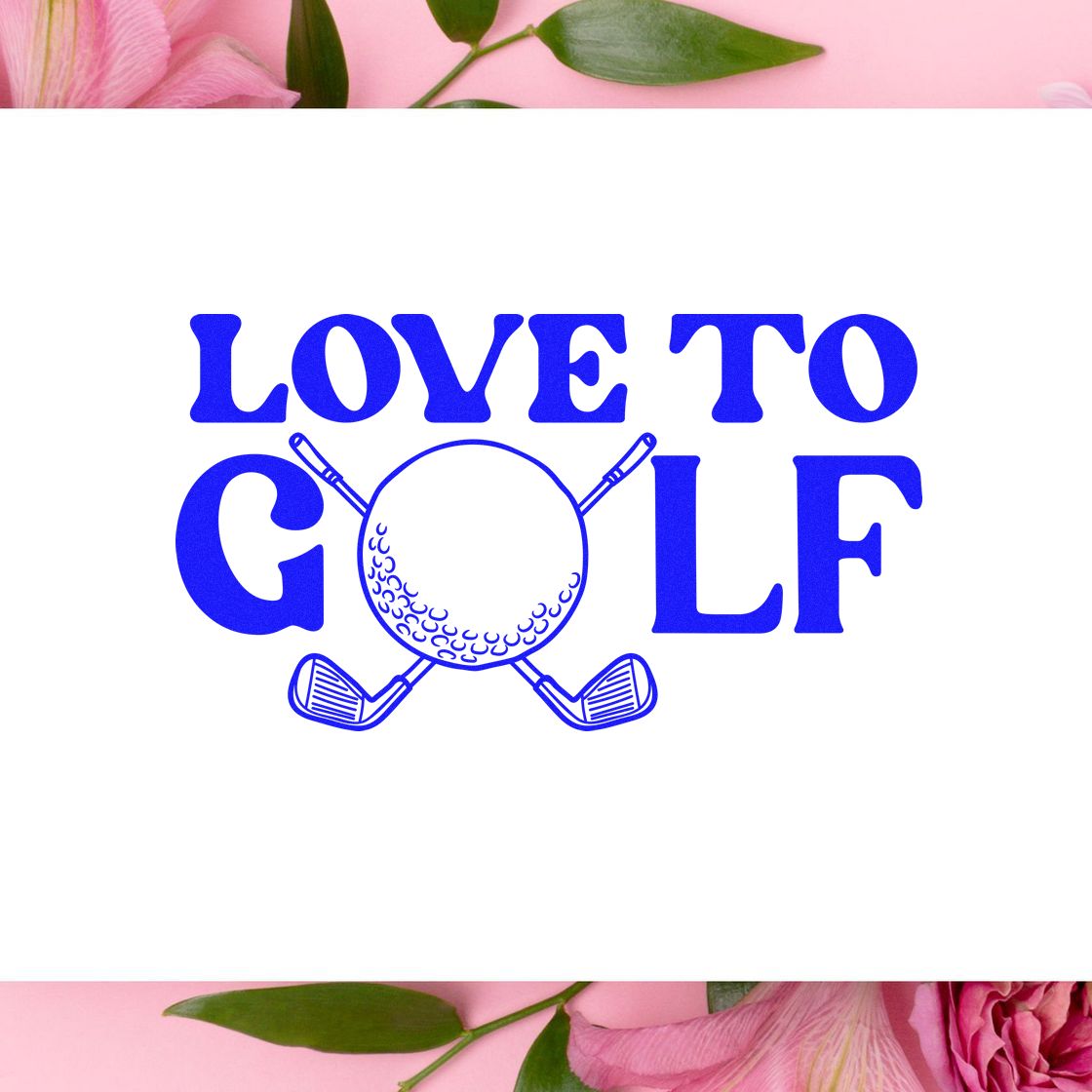 Blue LOVE TO GOLF stamp and seal design with crossed golf clubs and ball on a pink floral background.