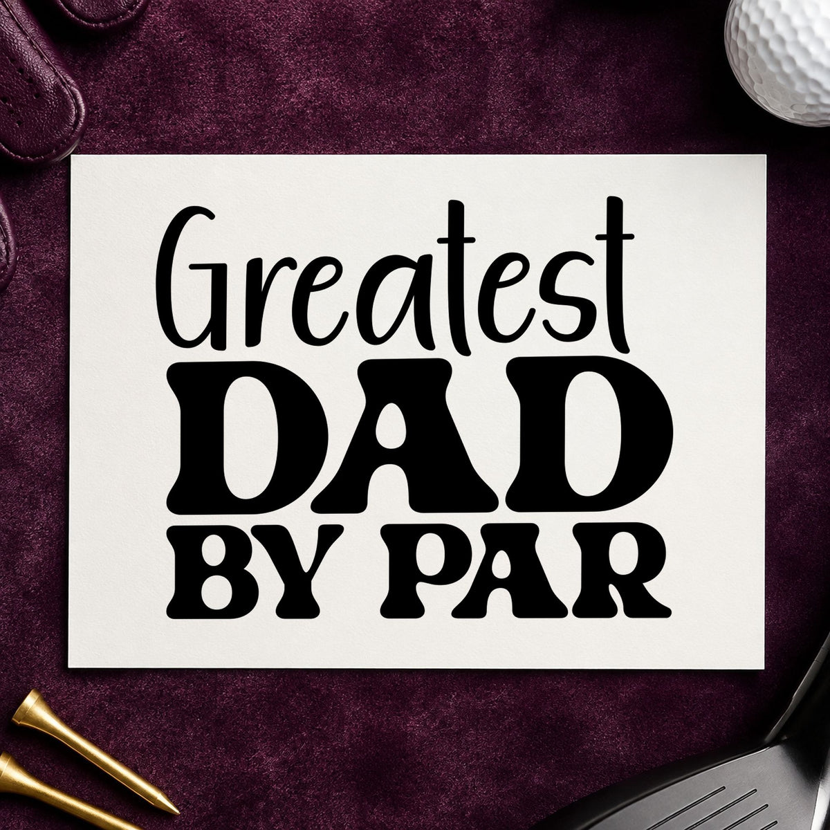 Greatest Dad By Par craft stamp imprint in black ink on a handmade project, one idea being old club gift tags.