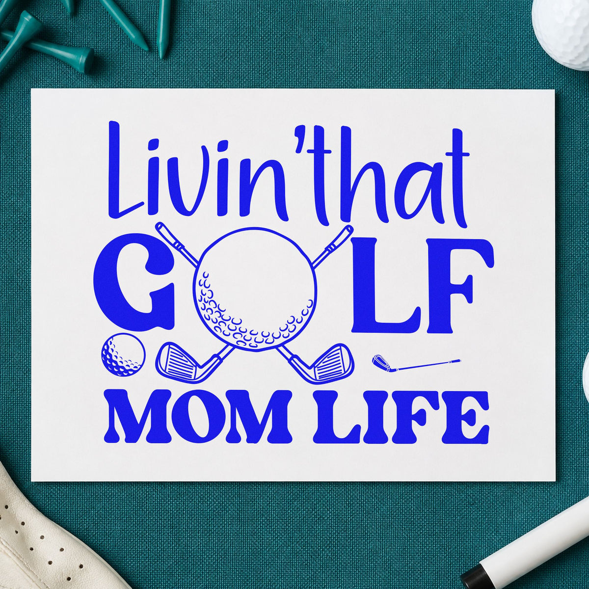 Living Golf Mom Life craft stamp imprinted in blue ink on paper, a design suited to framed garage hook.