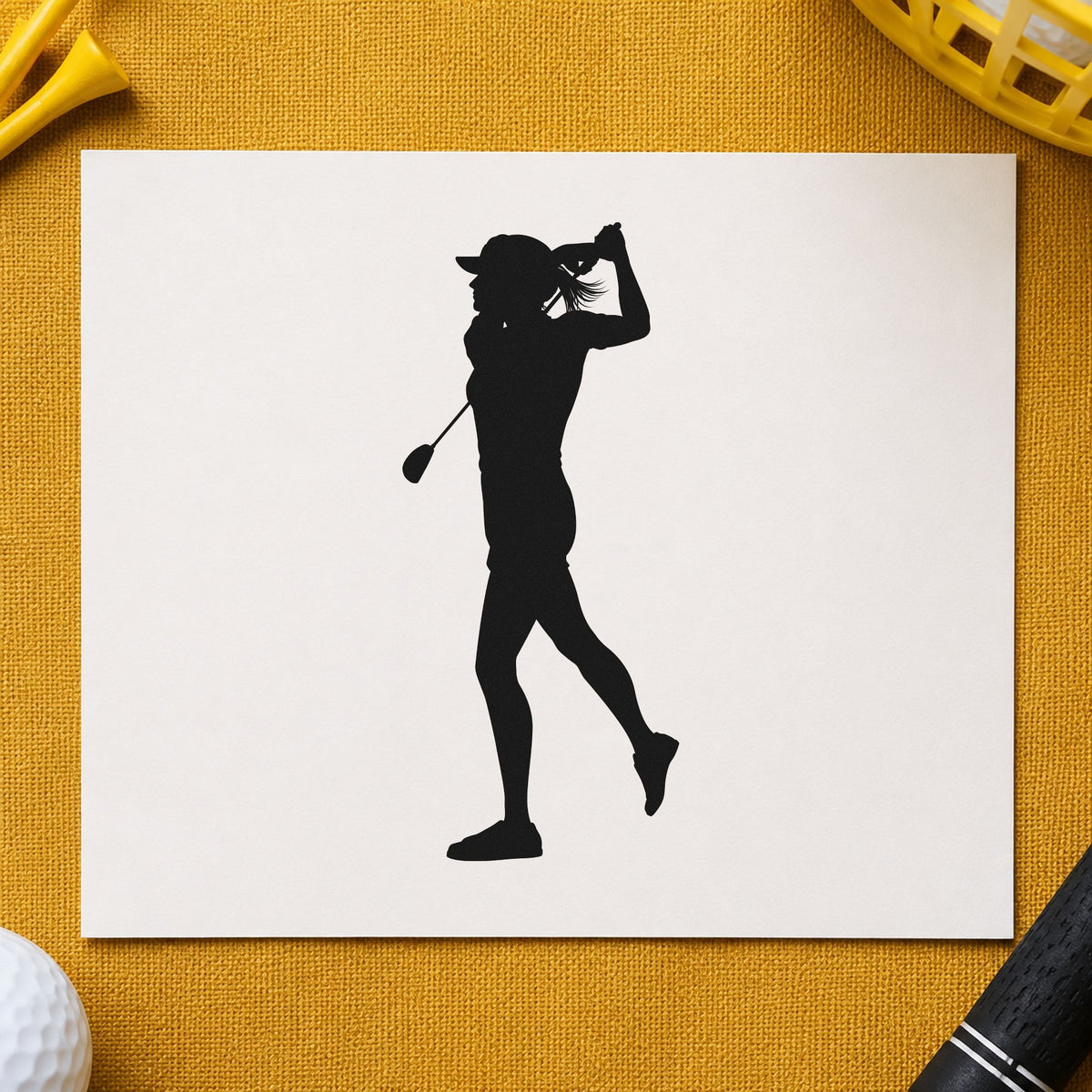 Golfer Follow Through Silhouette craft stamp imprint in black ink on a handmade project, one idea being road kit gift tags.