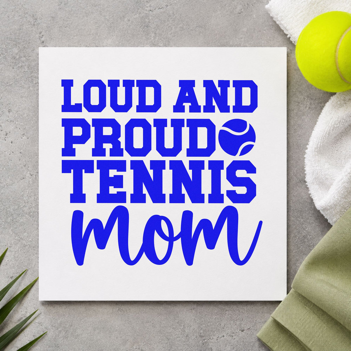 Loud Proud Tennis Mom craft stamp imprinted in blue ink on paper, a design suited to framed garage hook.
