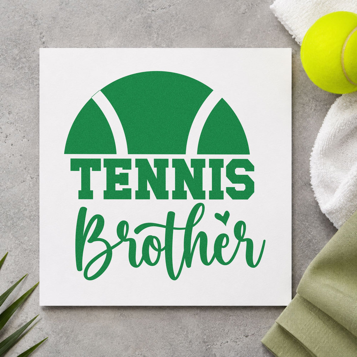 Tennis Brother Half Ball craft stamp in green ink on cardstock, an easy option for baseline album page.