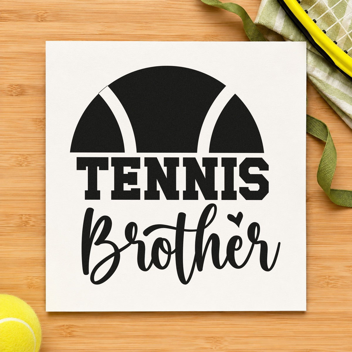Tennis Brother Half Ball craft stamp imprint in black ink on a handmade project, one idea being water bottle tags.