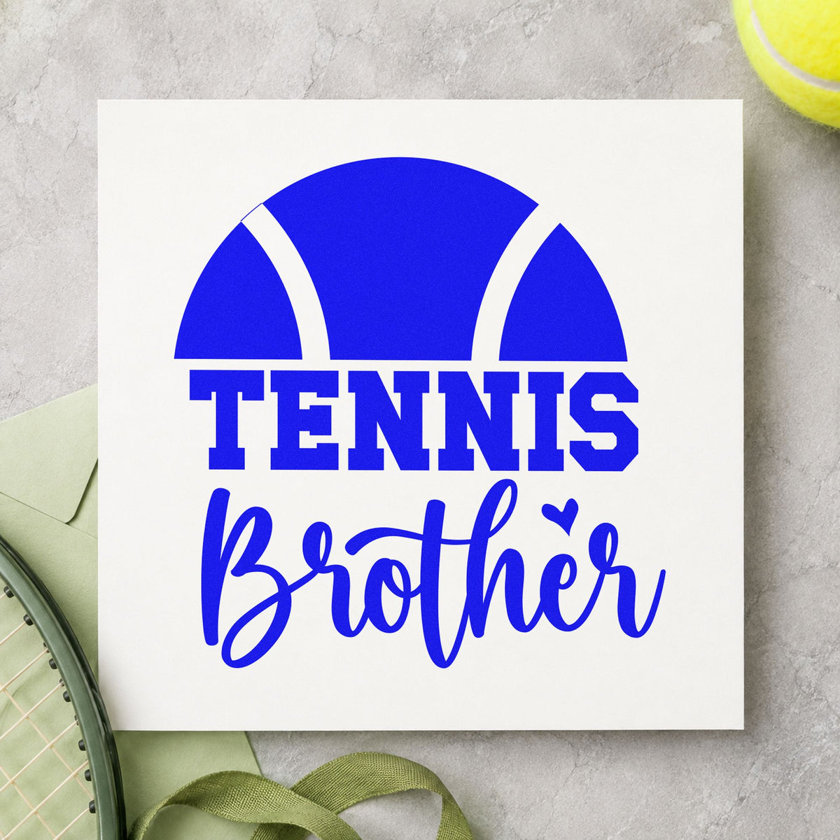 Tennis Brother Half Ball craft stamp imprinted in blue ink on paper, a design suited to framed court hut.
