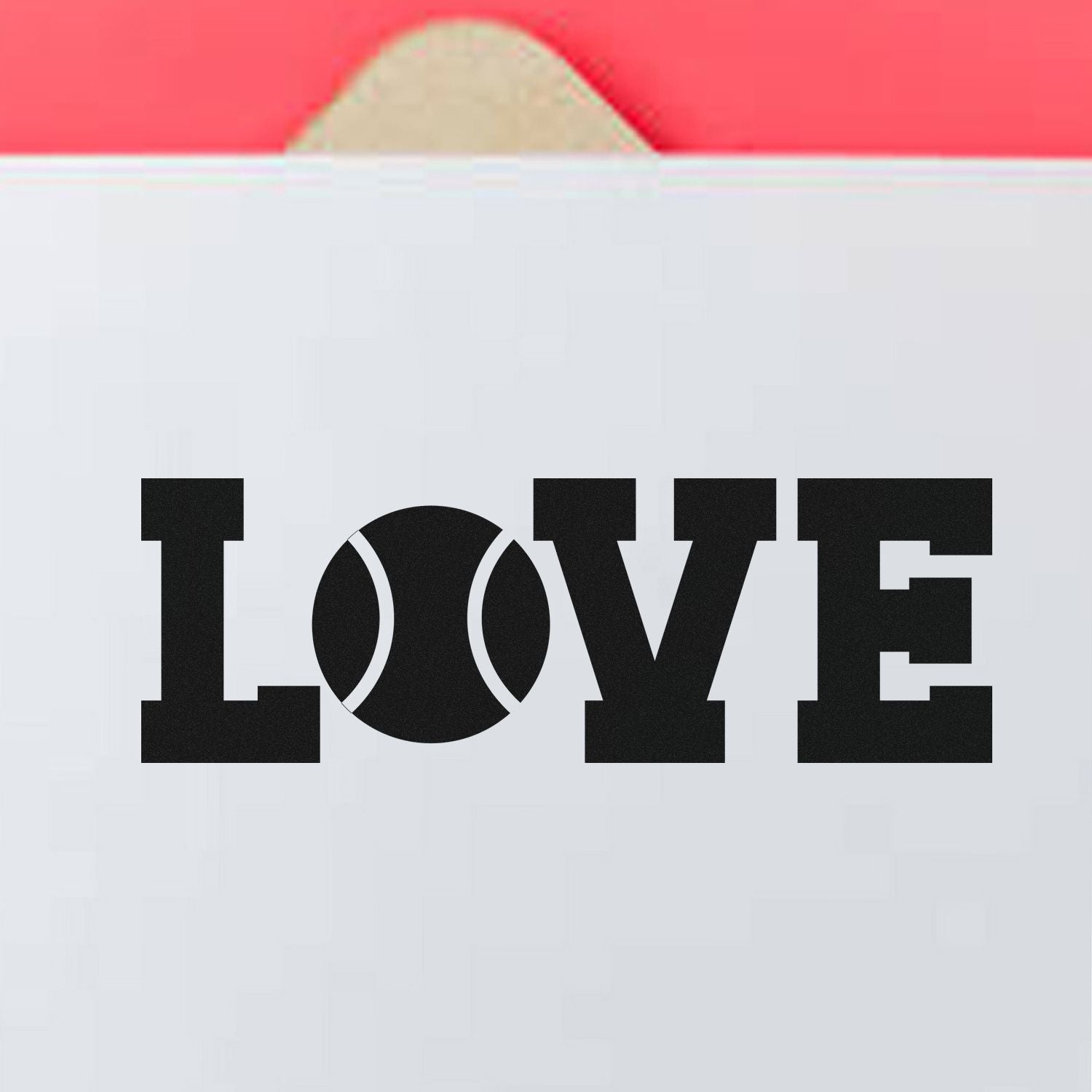 Stamp and seal on a white envelope with red flap, showing bold black LOVE text and a tennis ball-style O.