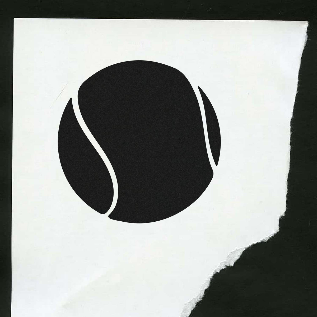 Matte black rubber stamp seal logo on torn white paper with rough edges