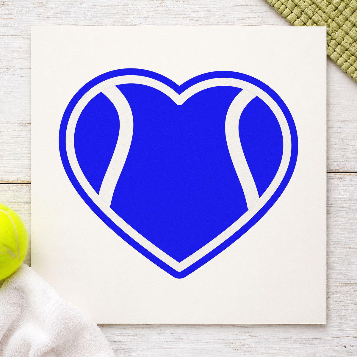 Tennis Ball Heart Outline craft stamp in blue ink on cardstock, an easy option for fence banner printing.
