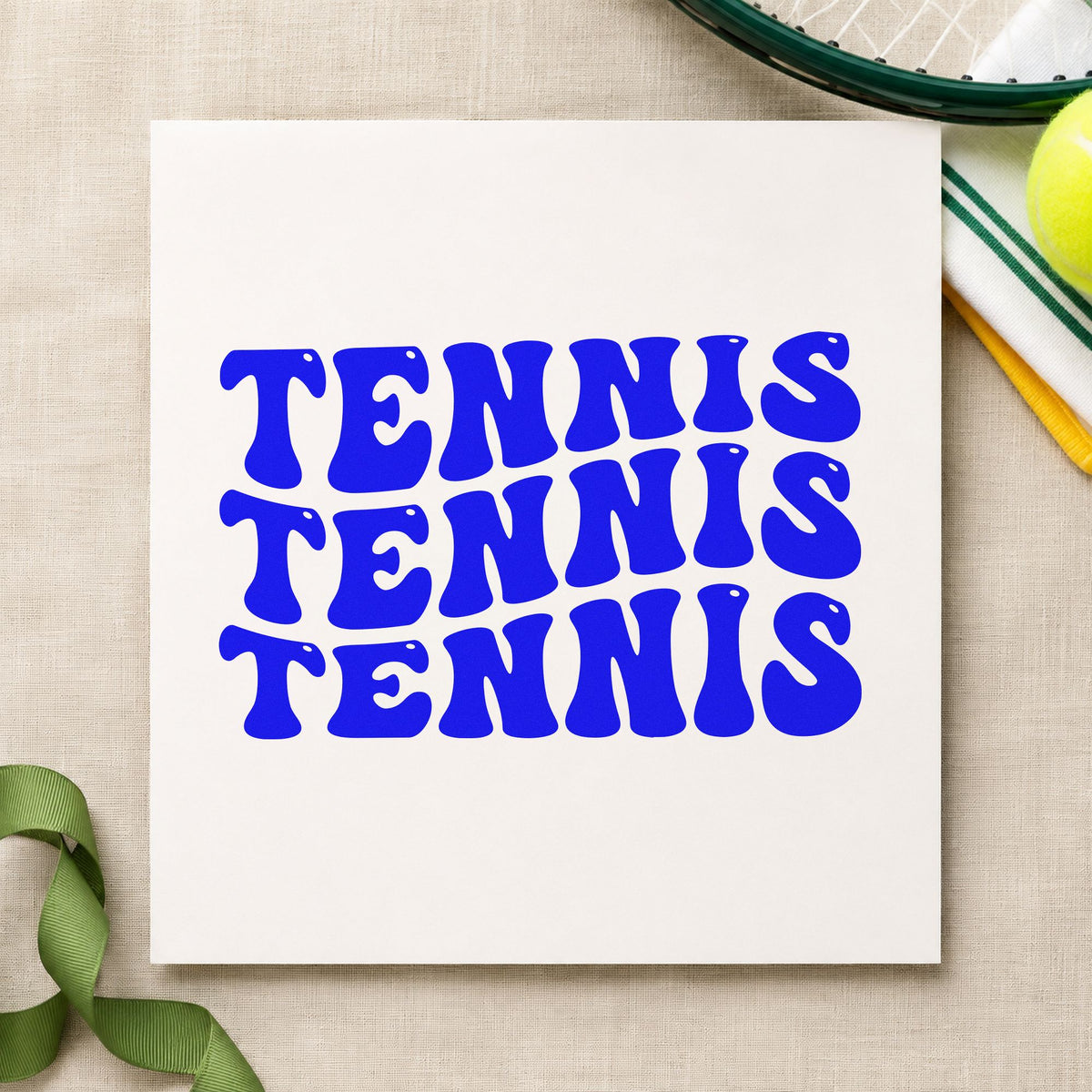 Repeated Wavy Tennis Lettering craft stamp in blue ink on cardstock, an easy option for counter cloth printing.