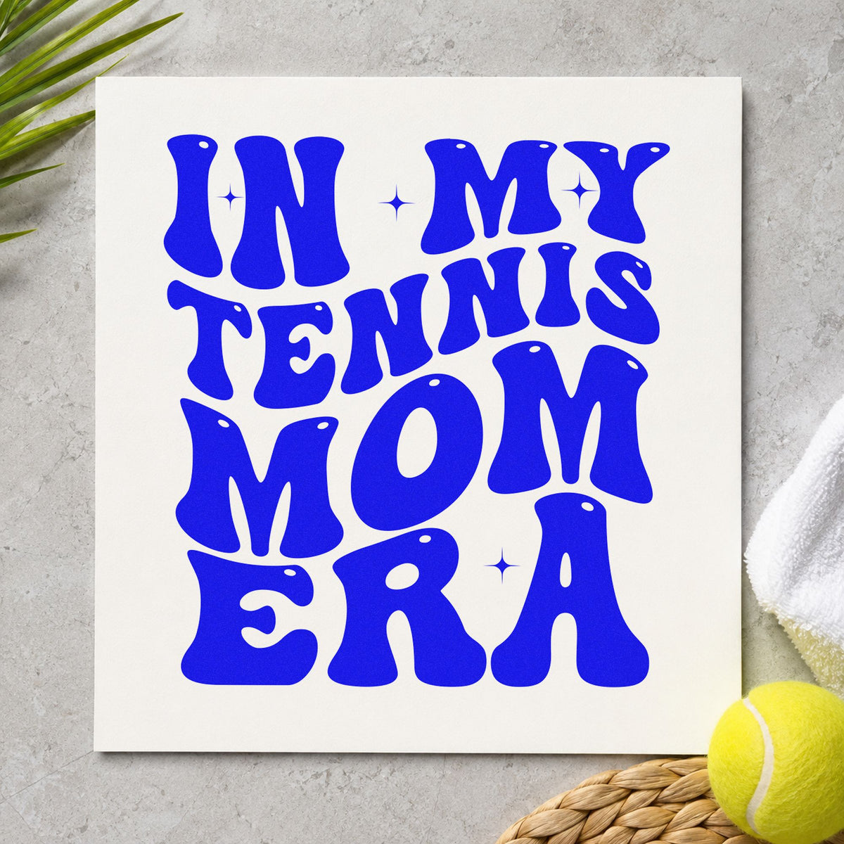 Tennis Mom Era Lettering craft stamp imprinted in blue ink on paper, a design suited to framed kitchen nook.