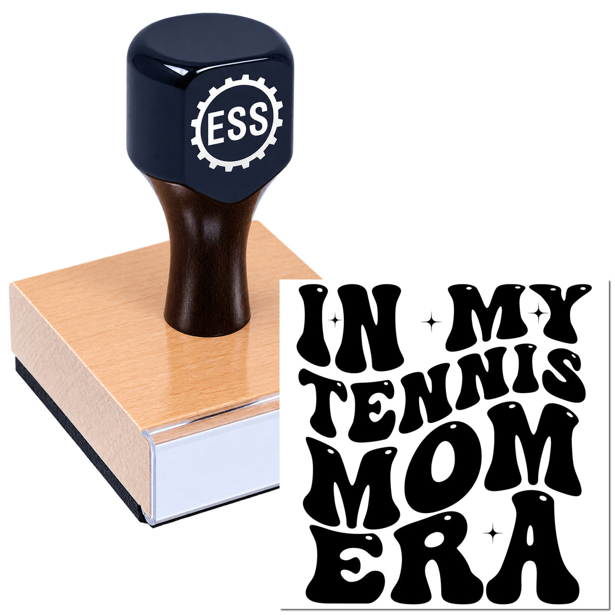 Black self-inking ESS stamp on a pink seal block with bold black "In My Tennis Mom Era" text.