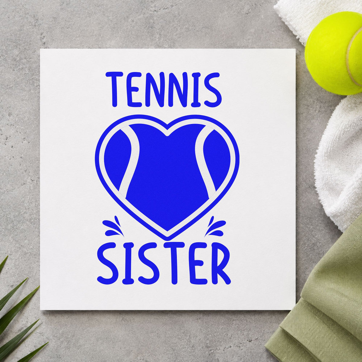 Tennis Sister Heart Ball craft stamp imprinted in blue ink on paper, a design suited to framed family shelf.
