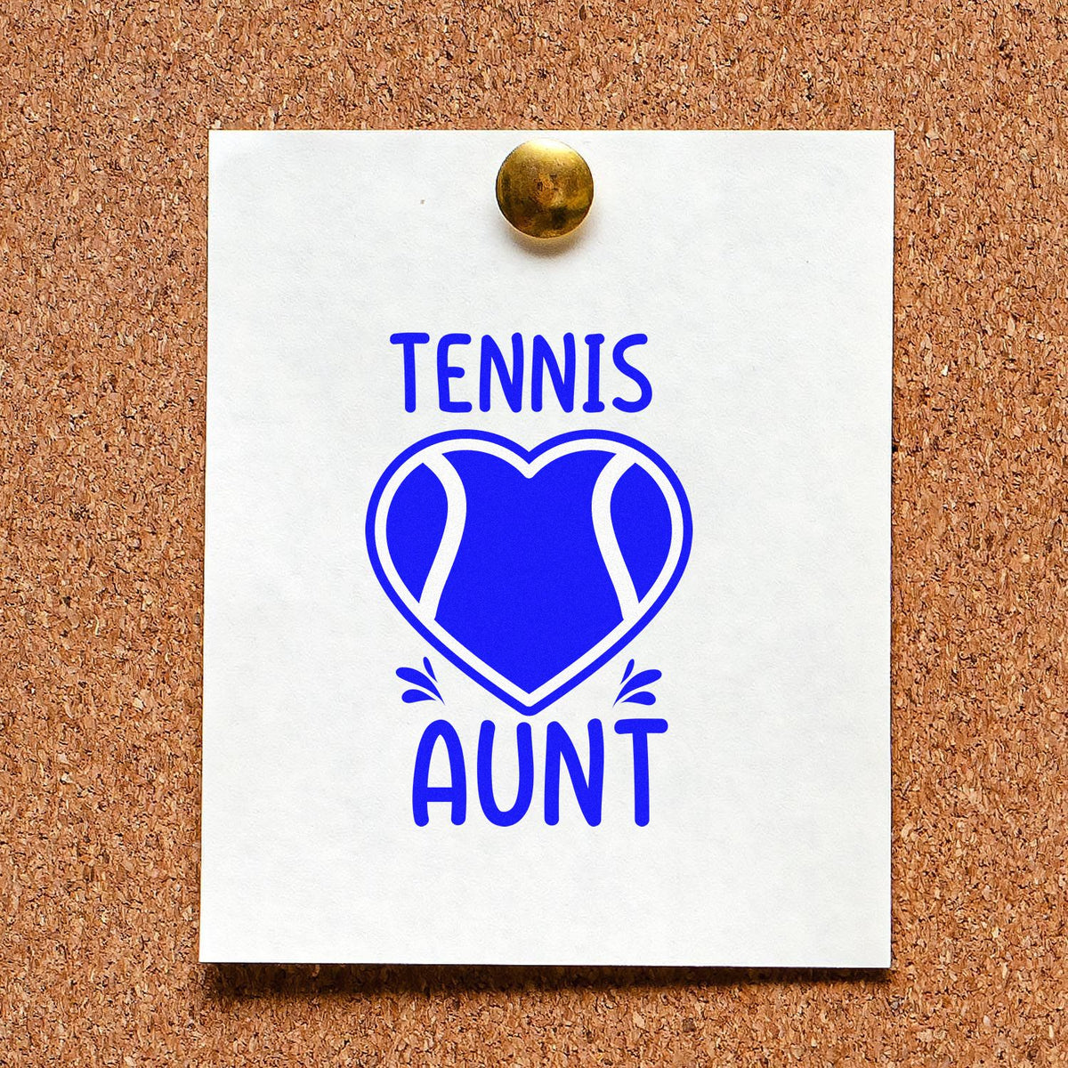 Blue tennis aunt stamp seal design on white card with heart tennis ball emblem, pinned to corkboard with gold pushpin.