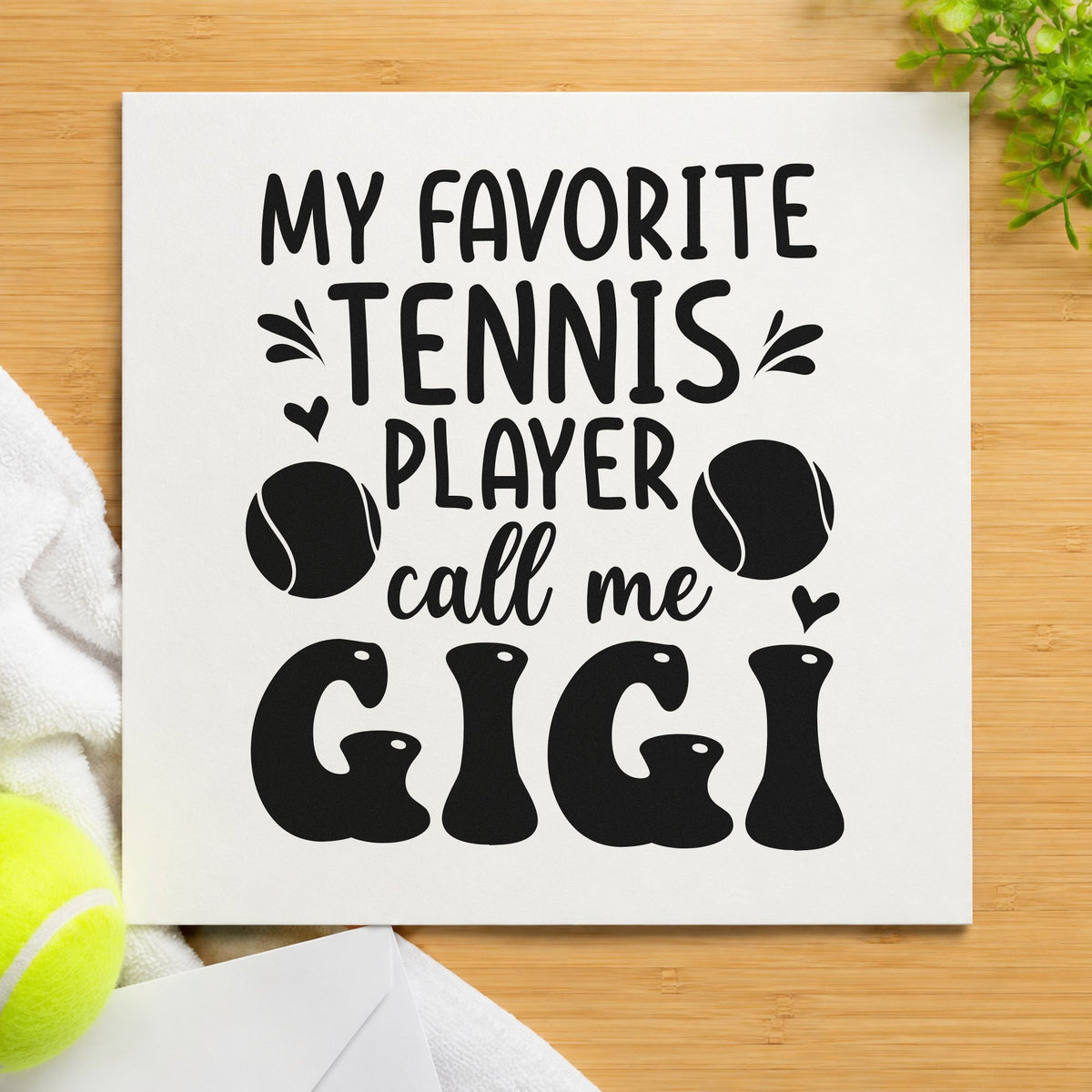 Favorite Tennis Player Gigi craft stamp imprint in black ink on a handmade project, one idea being care box gift tags.