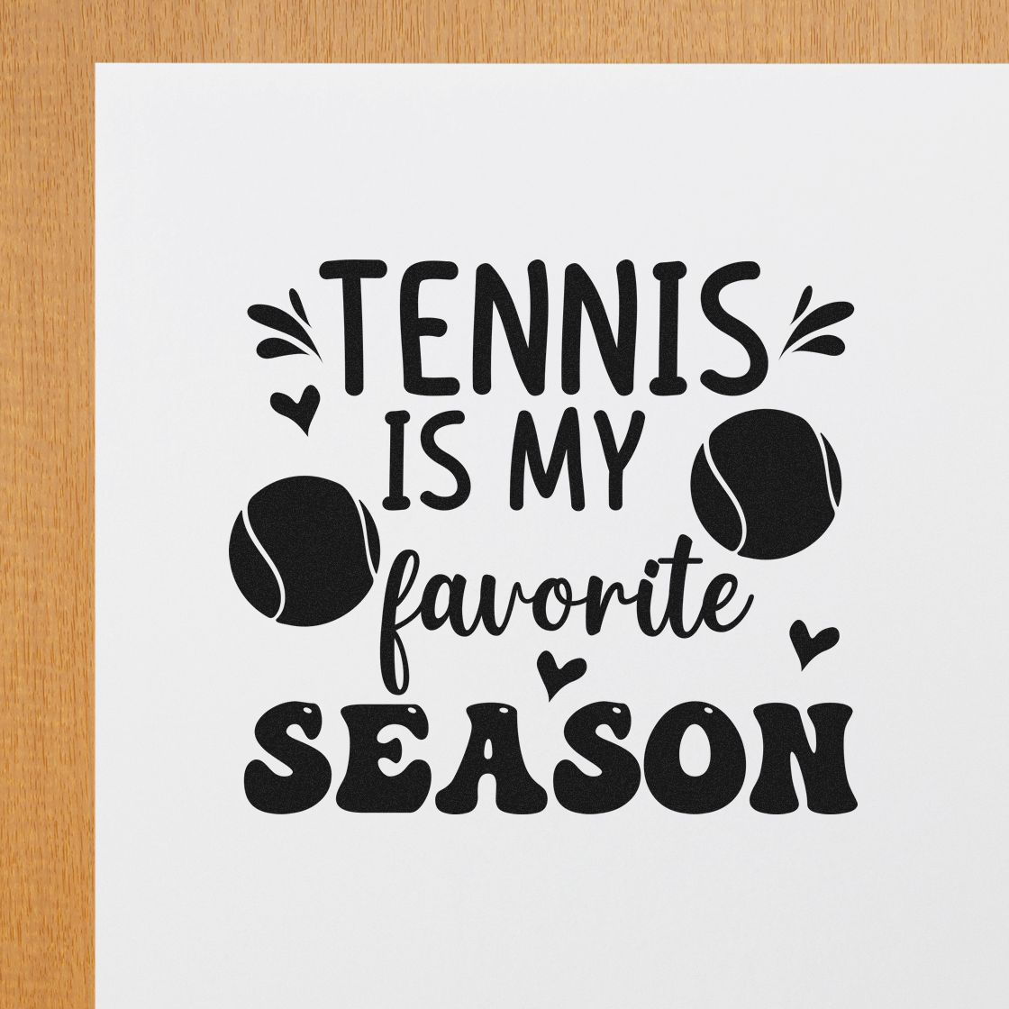 Black tennis-themed stamp and seal design on white paper, reading Tennis is my favorite season with tennis balls and hearts.