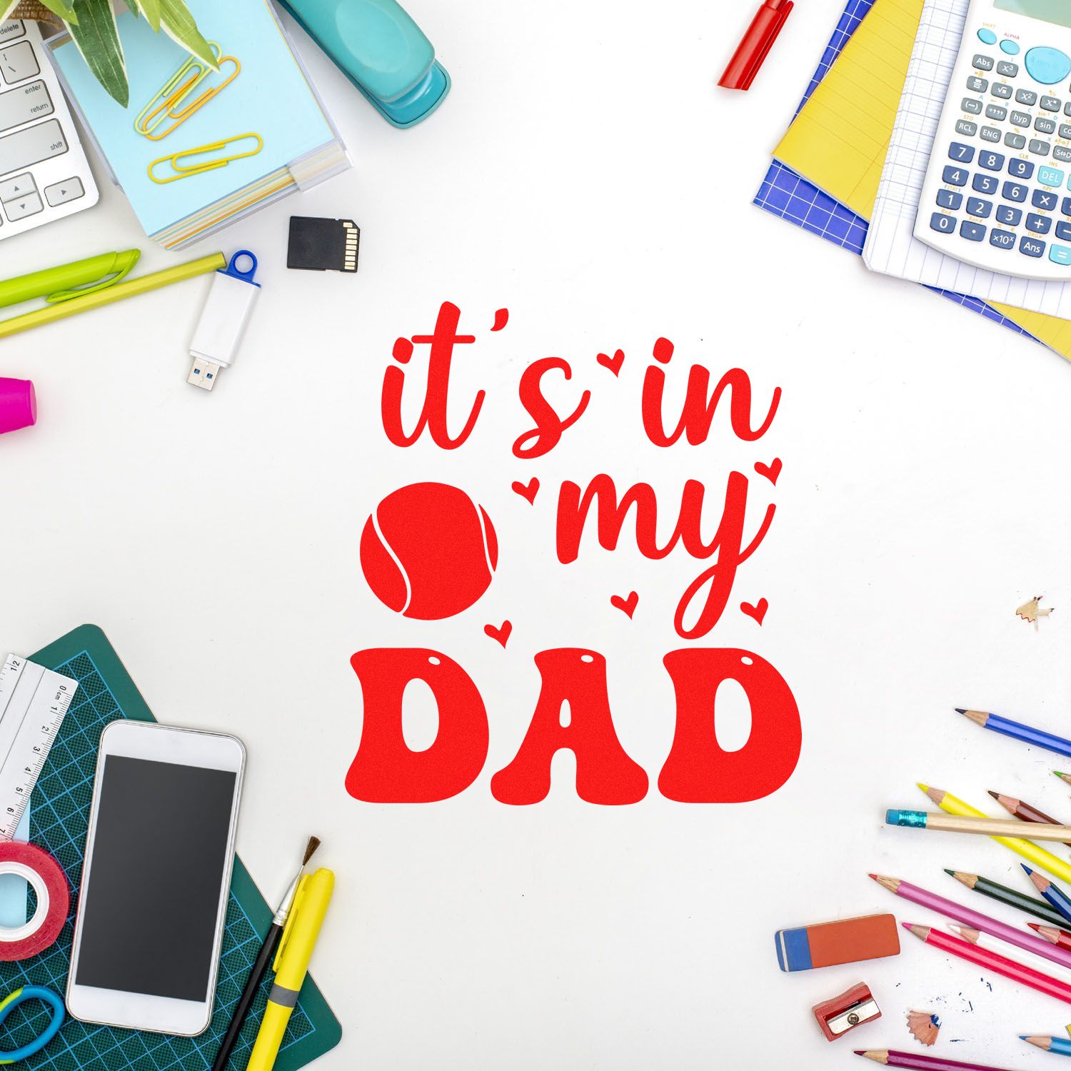 Red 'it's in my DAD' stamp and seal design with baseball icon on a white desk, surrounded by colorful stationery.