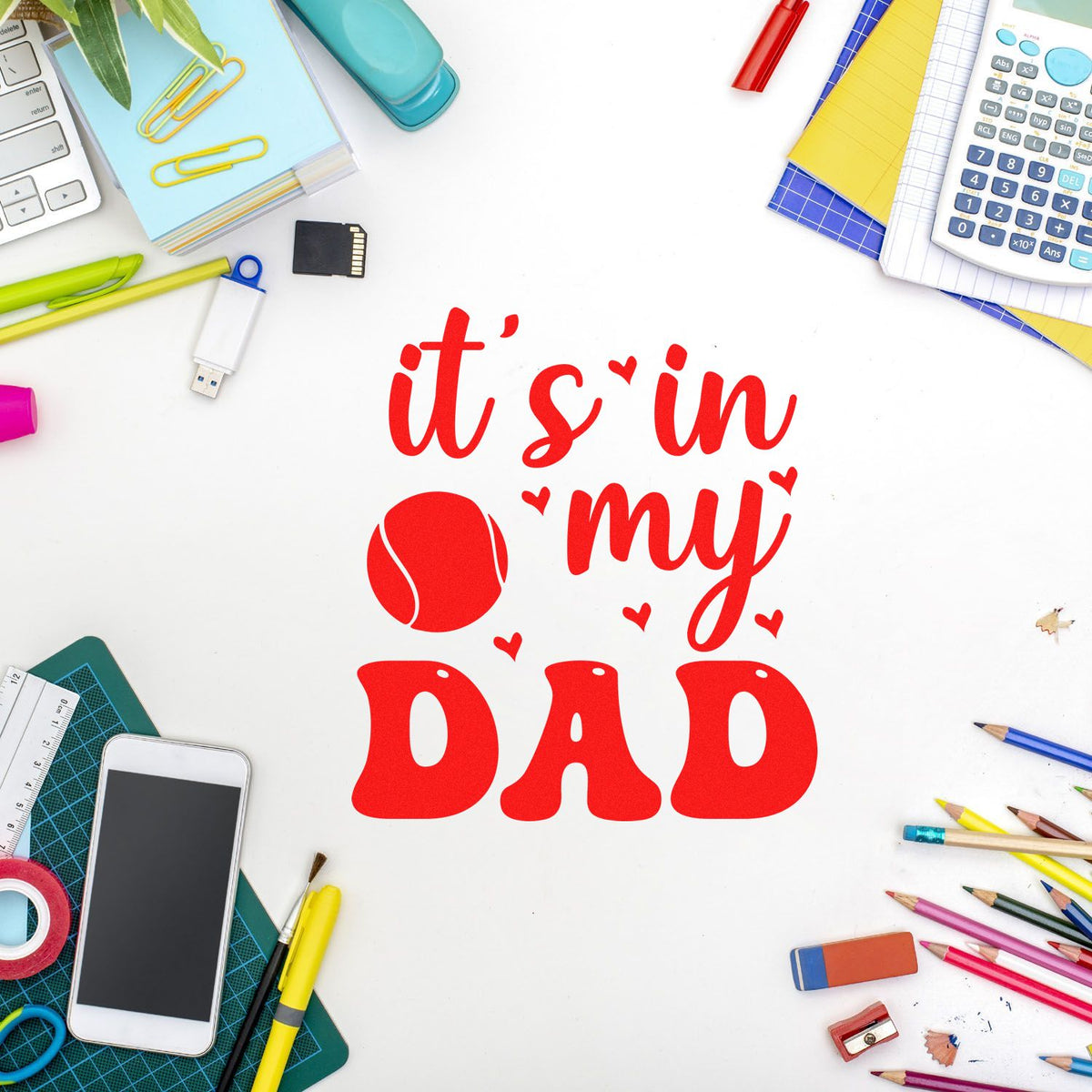 Red custom stamp seal reading its in my DAD on white, surrounded by colorful school and office supplies.