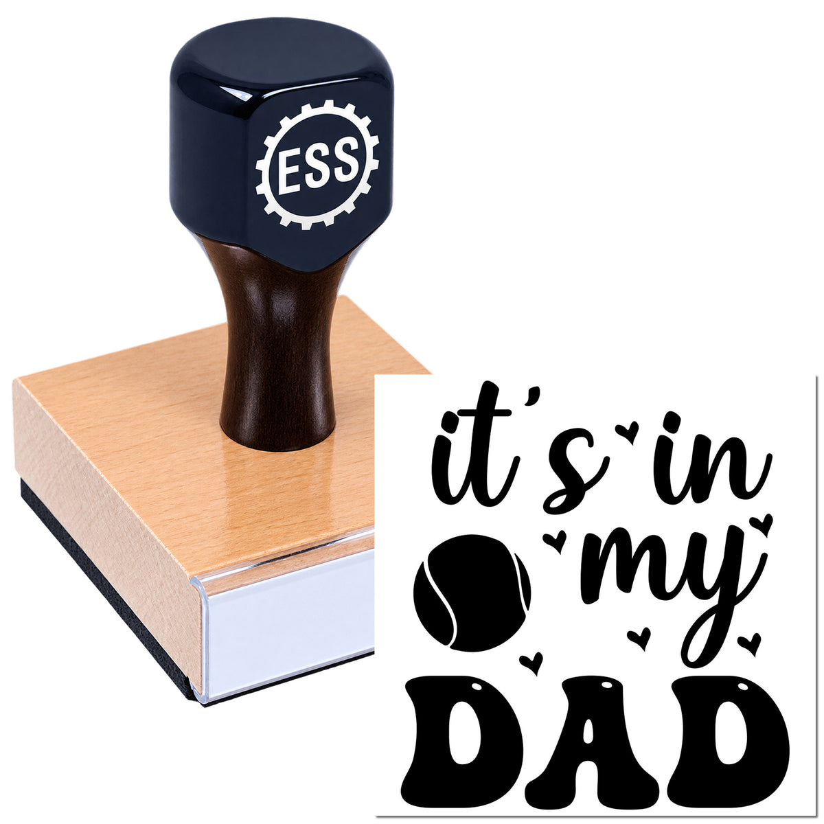 Black custom rubber stamp and seal on a pink block, with "it's in my DAD" lettering and small hearts.