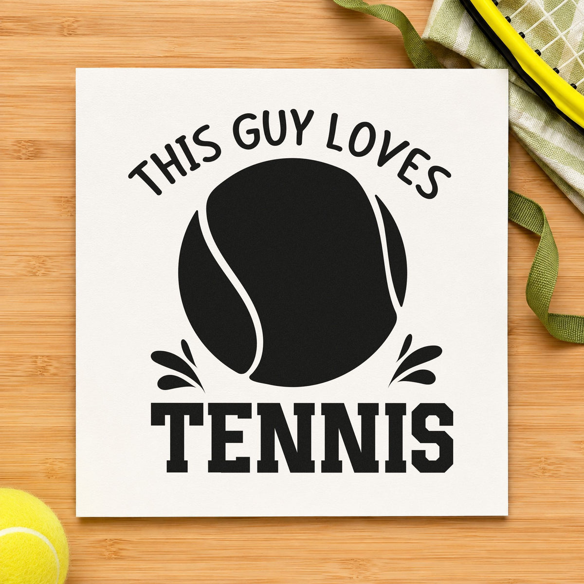 This Guy Loves Tennis craft stamp imprint in black ink on a handmade project, one idea being birthday gift tags.