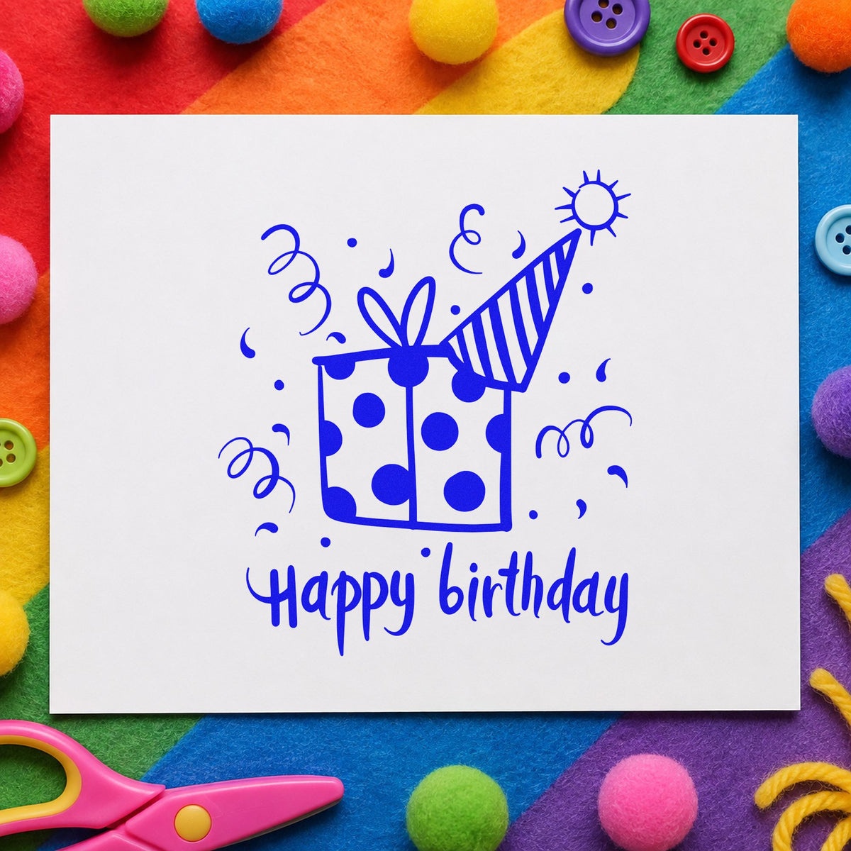 Birthday Gift Party Hat craft stamp in blue ink on cardstock, an easy option for table skirt printing.