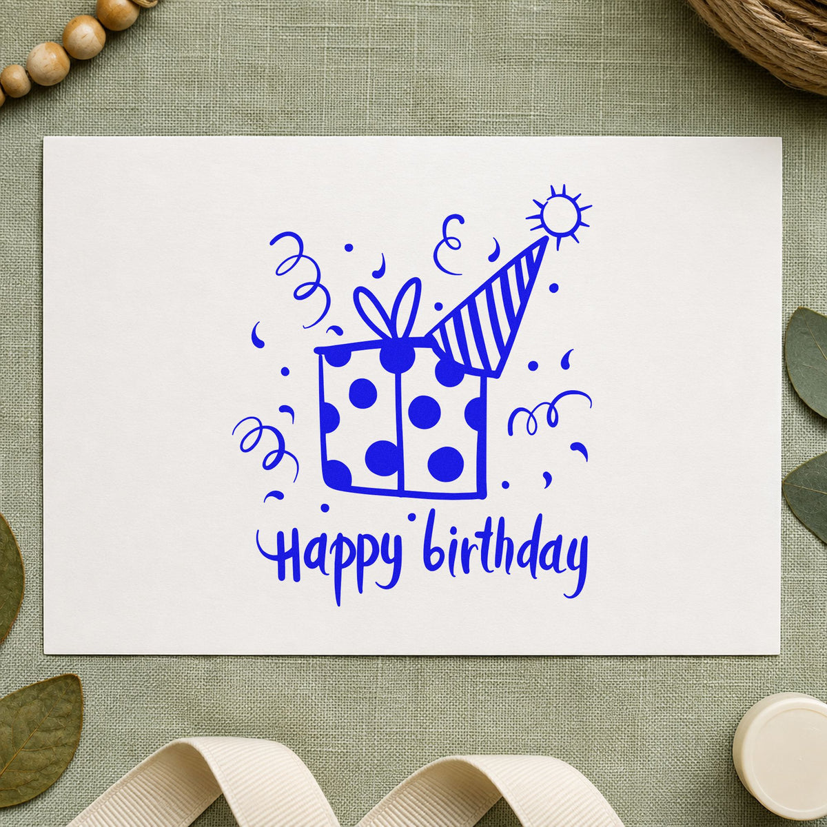 Birthday Gift Party Hat craft stamp imprinted in blue ink on paper, a design suited to framed front hall.