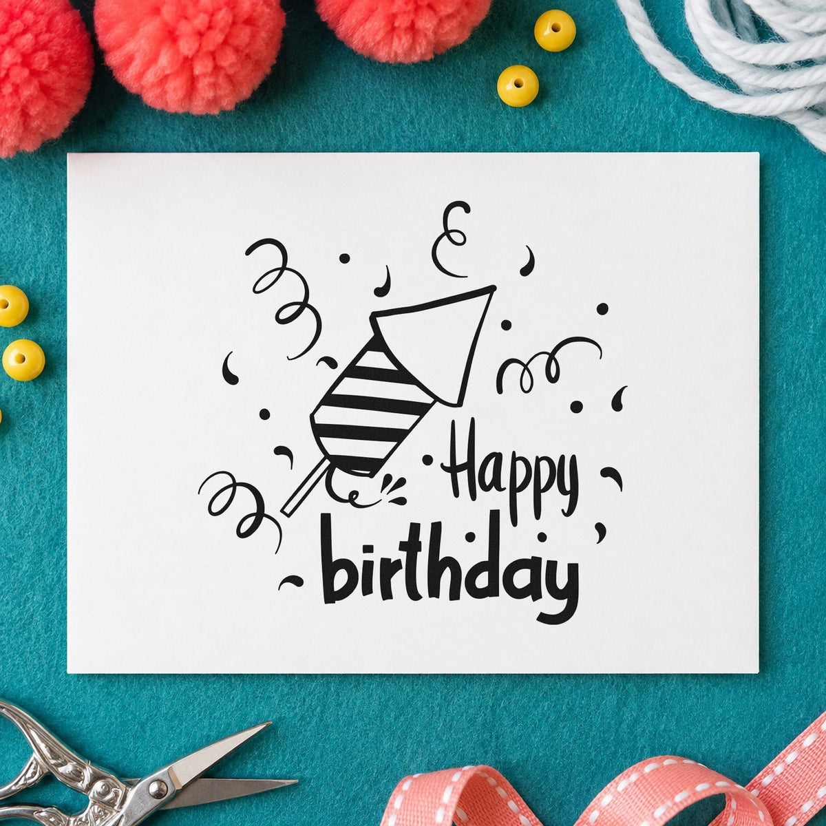 Birthday Party Horn Confetti craft stamp imprint in black ink on a handmade project, one idea being door gift tags.