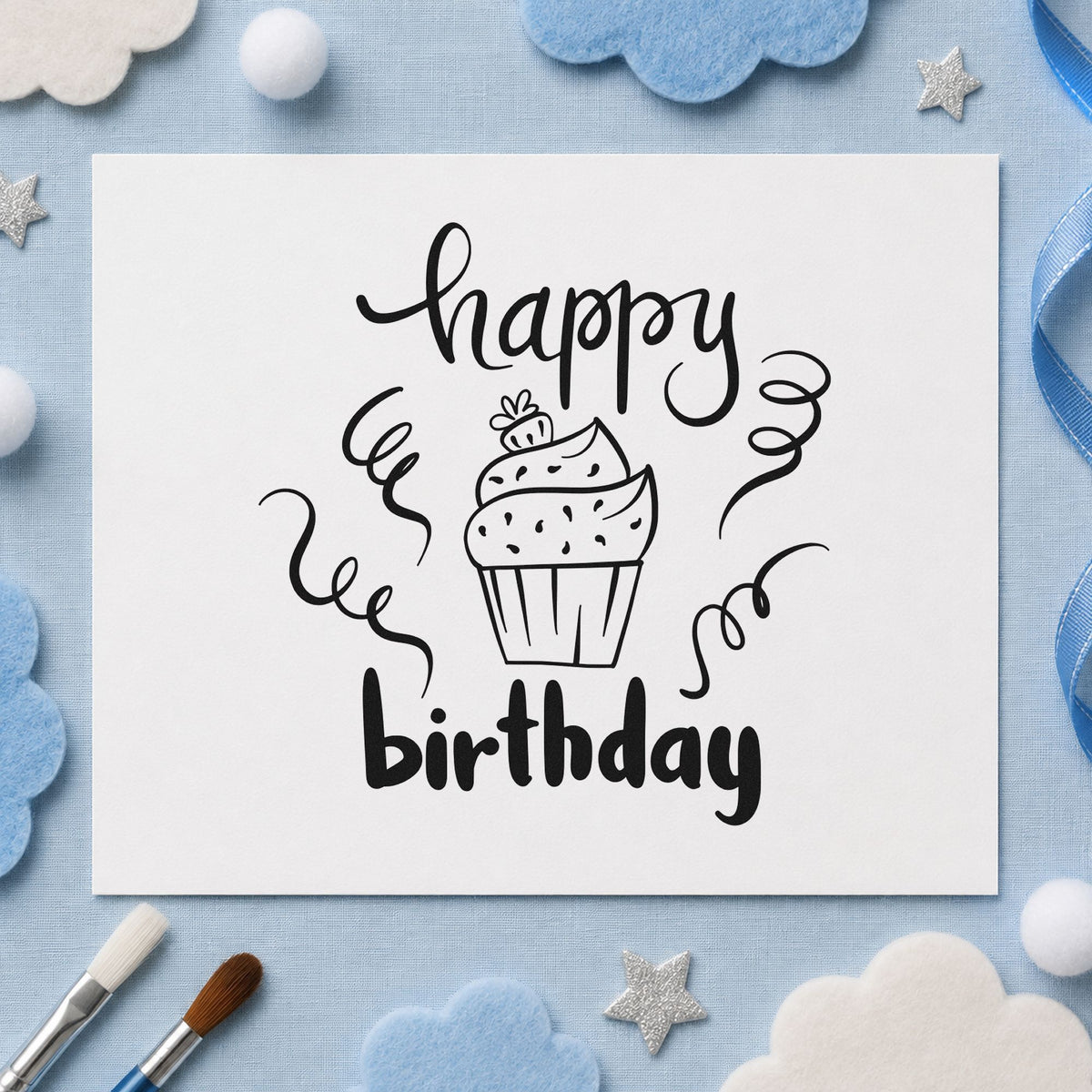 Happy Birthday Cupcake Streamers craft stamp imprint in black ink on a handmade project, one idea being cupcake box tags.