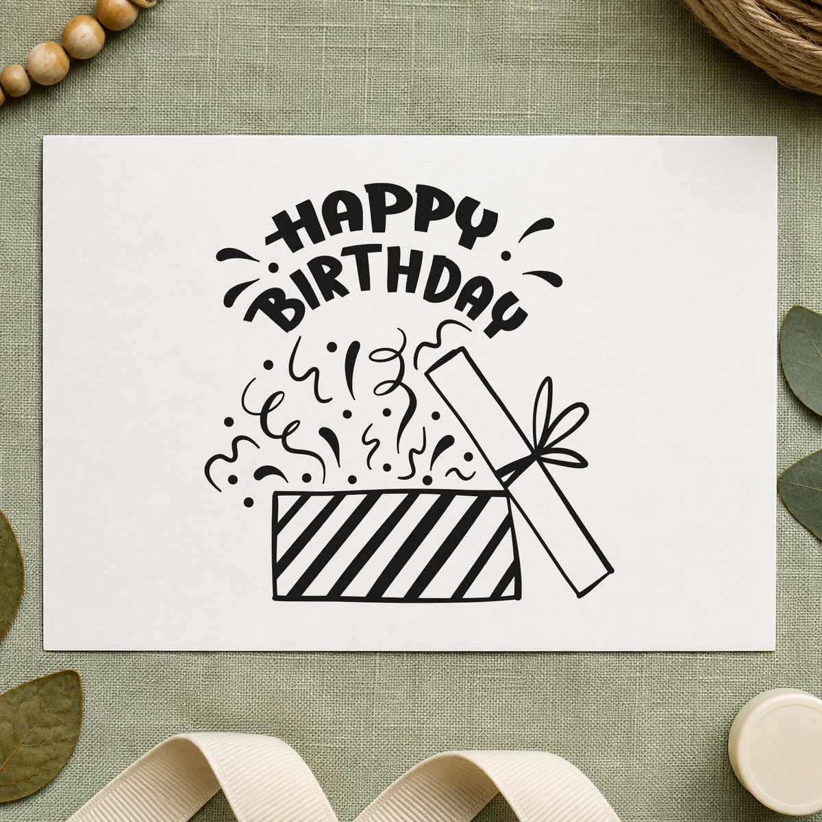 Birthday Open Gift Confetti craft stamp in black ink on cardstock, an easy option for wrapping album page.