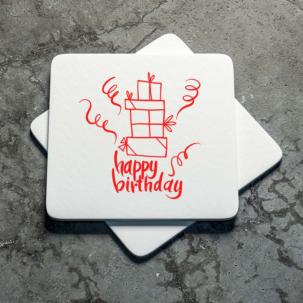 White stamp and seal products with red happy birthday gift design and confetti on gray stone background