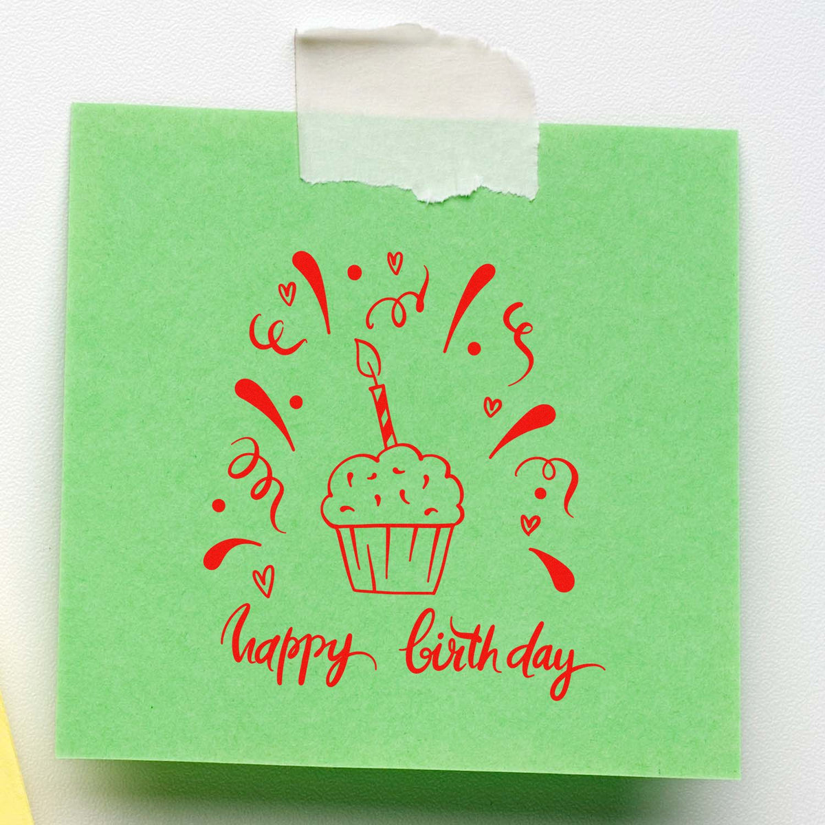 Green birthday stamp and seal with red cupcake, hearts, and happy birthday script on a mint-green background.