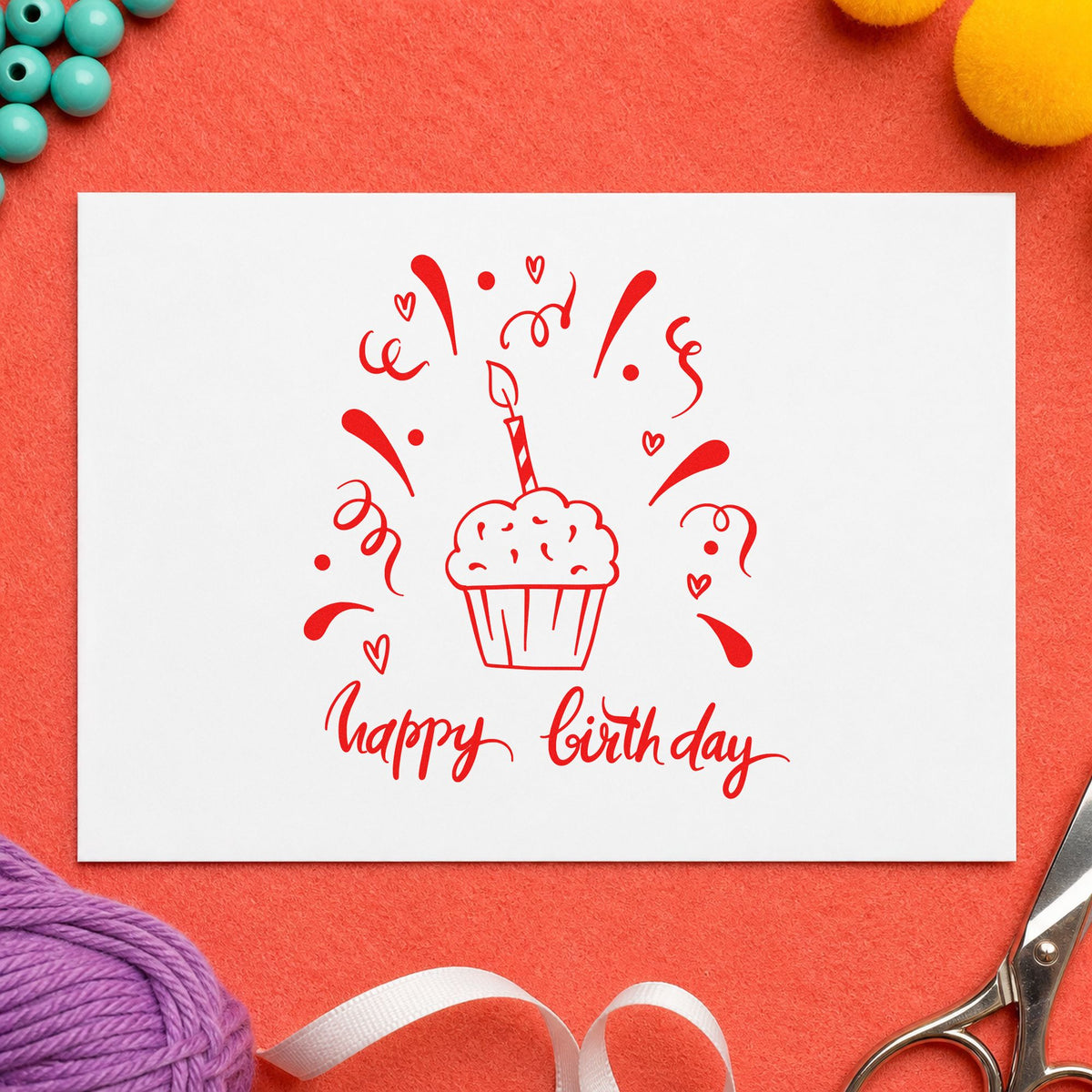 Birthday Cupcake Candle Confetti craft stamp imprint in red ink on a handmade project, one idea being class sign cards.