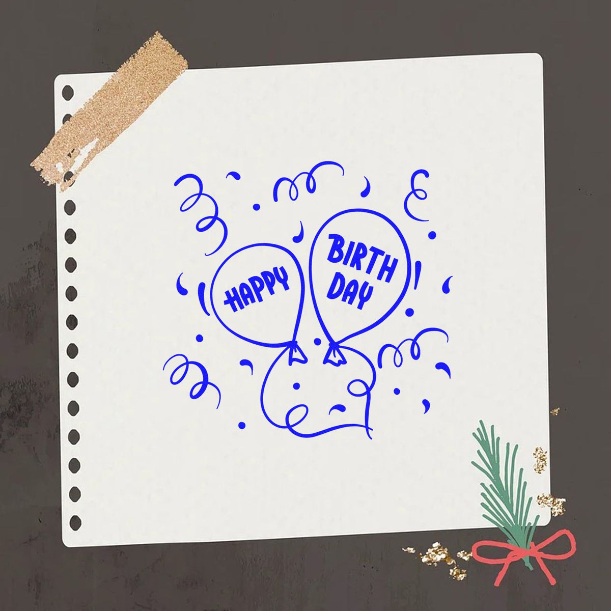 Blue Happy Birthday balloon seal stamp on white paper, with confetti, tape at top left, and festive sprig on dark background.