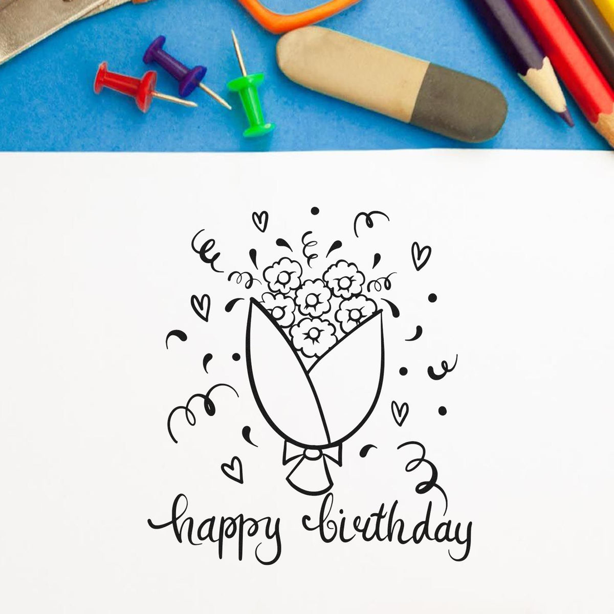 Birthday Flower Bouquet Hearts Premium Wooden Stamp - Vintage Pro imprint stamped in black ink. A wrapped flower bouquet appears above happy birthday among hearts and curling streamers.
