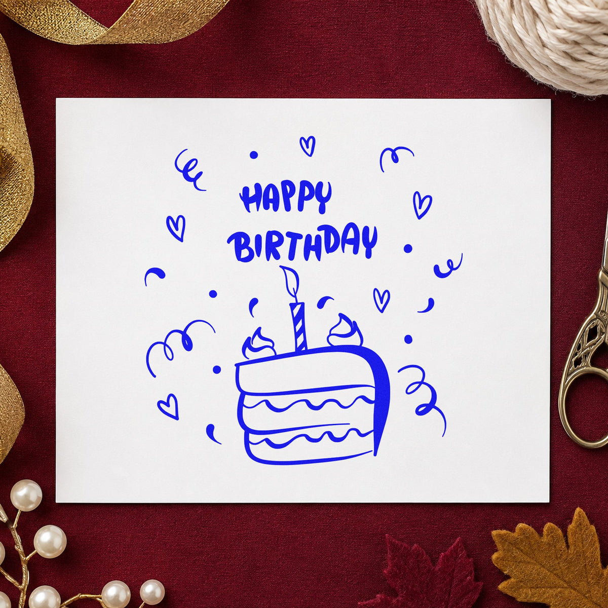 Birthday Candle Cake Slice craft stamp in blue ink on cardstock, an easy option for server apron printing.