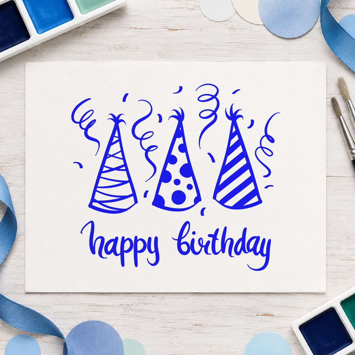 Birthday Three Party Hats craft stamp in blue ink on cardstock, an easy option for table runner printing.