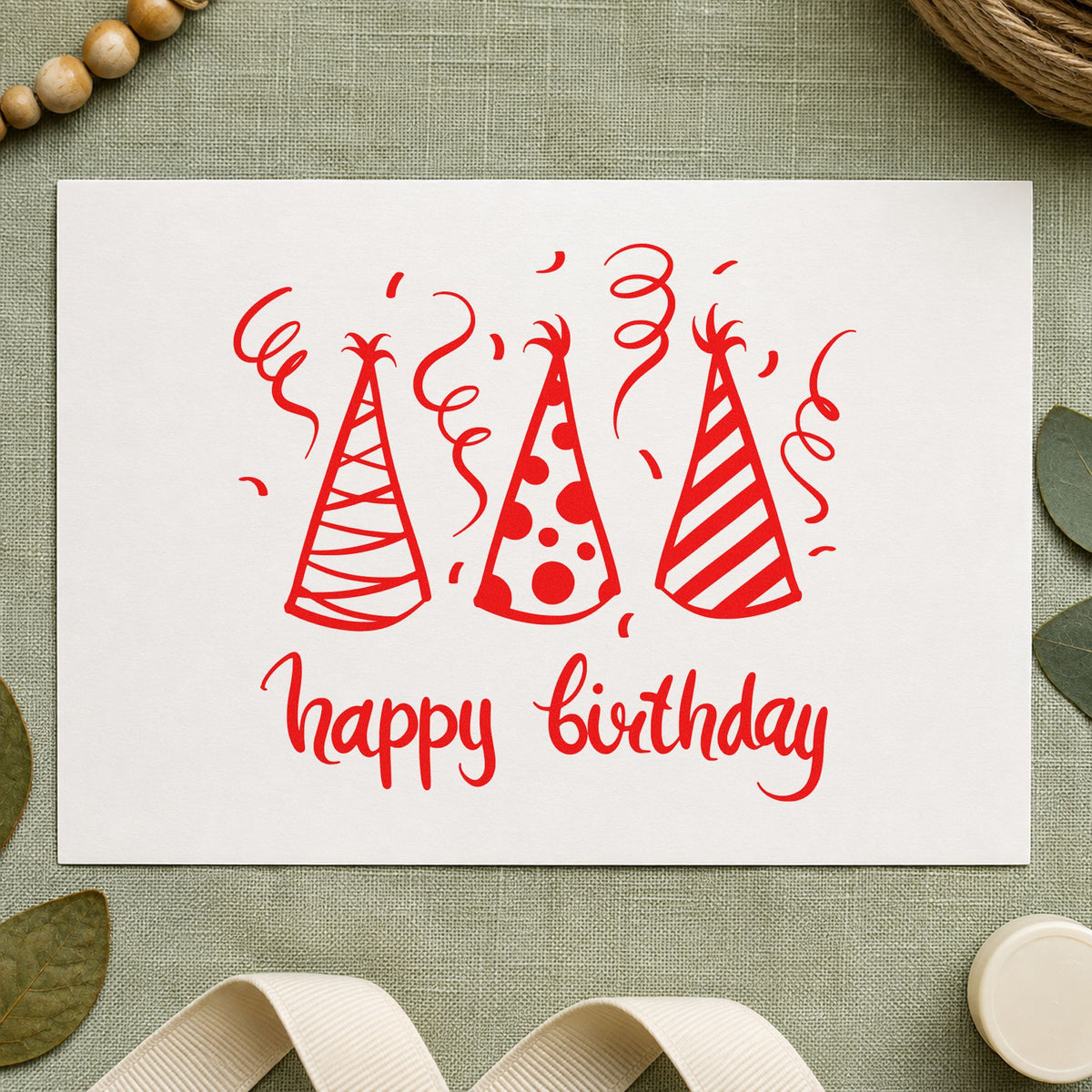 Birthday Three Party Hats craft stamp imprint in red ink on a handmade project, one idea being day plan cards.